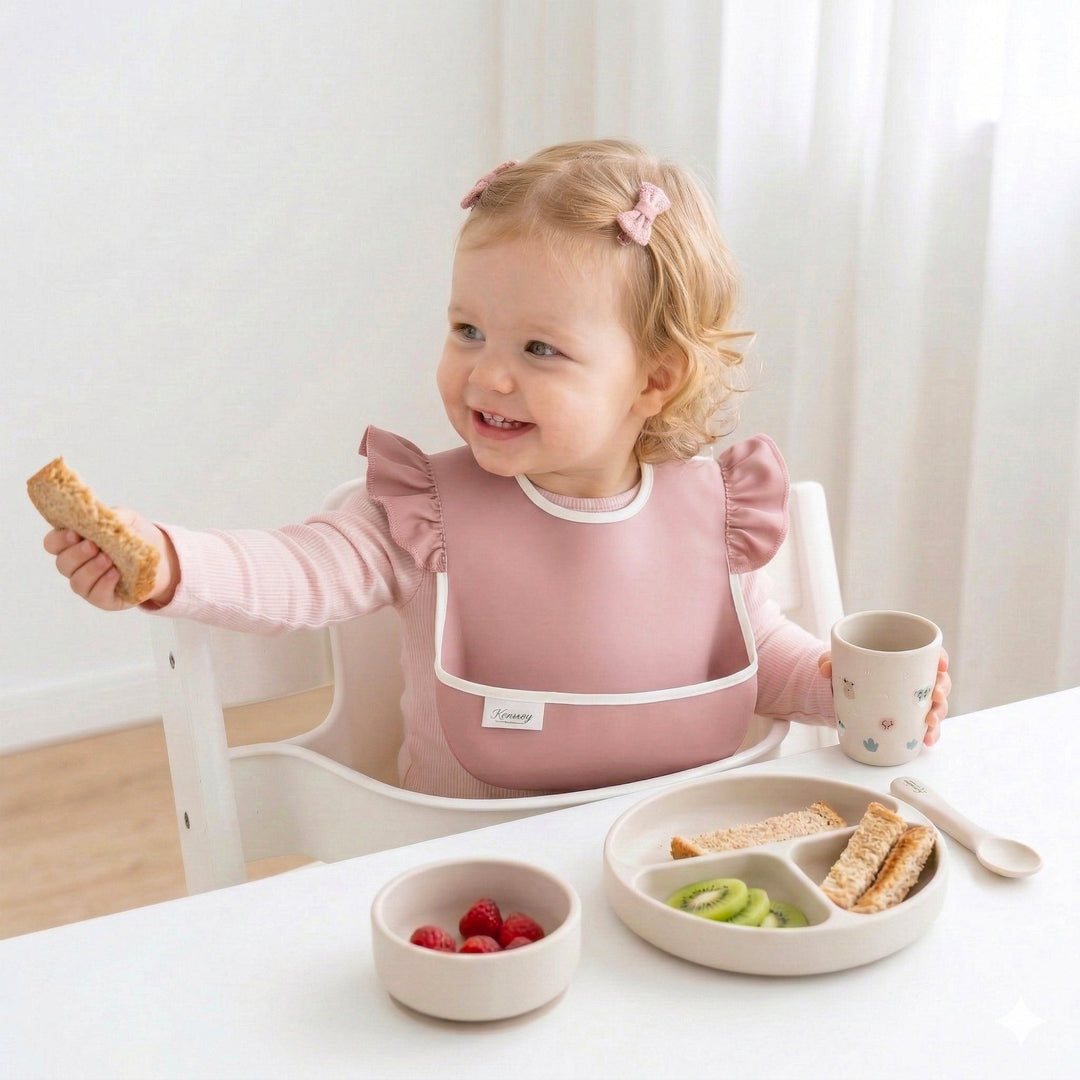 From First Bites to Self-Feeding: Why the Right Bib Matters for Your Toddler’s Milestones